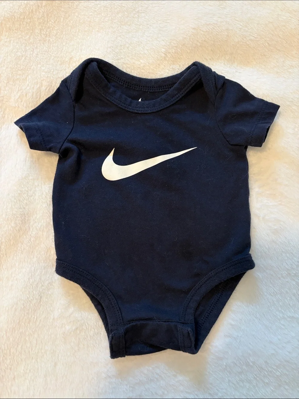 Nike newborn Navy One-Piece Bodysuit with White Swoosh